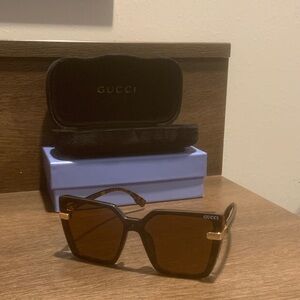 Gucci Tortoiseshell Sunglasses with Gold Accents
